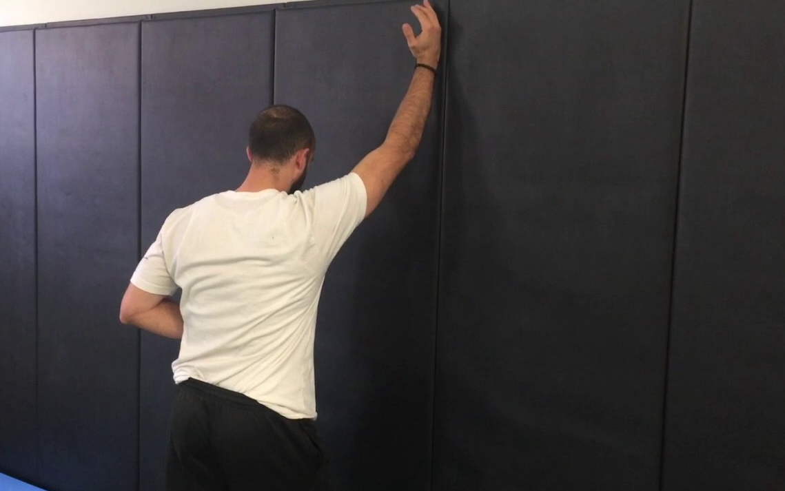 An alternative exercise to wall angels is the Single Arm Wall Slides