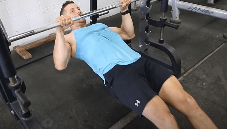The inverted barbell row is one such alternative to ring rows, and an effective one at that