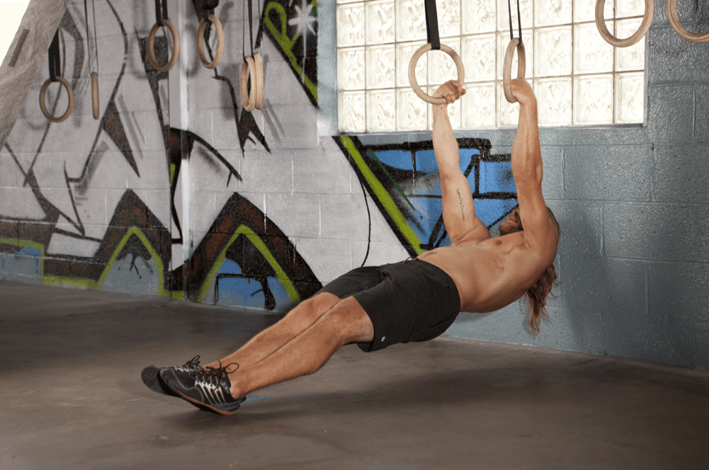 With this exercise, you pull your weight towards the ring with the foot on the ground or hanging