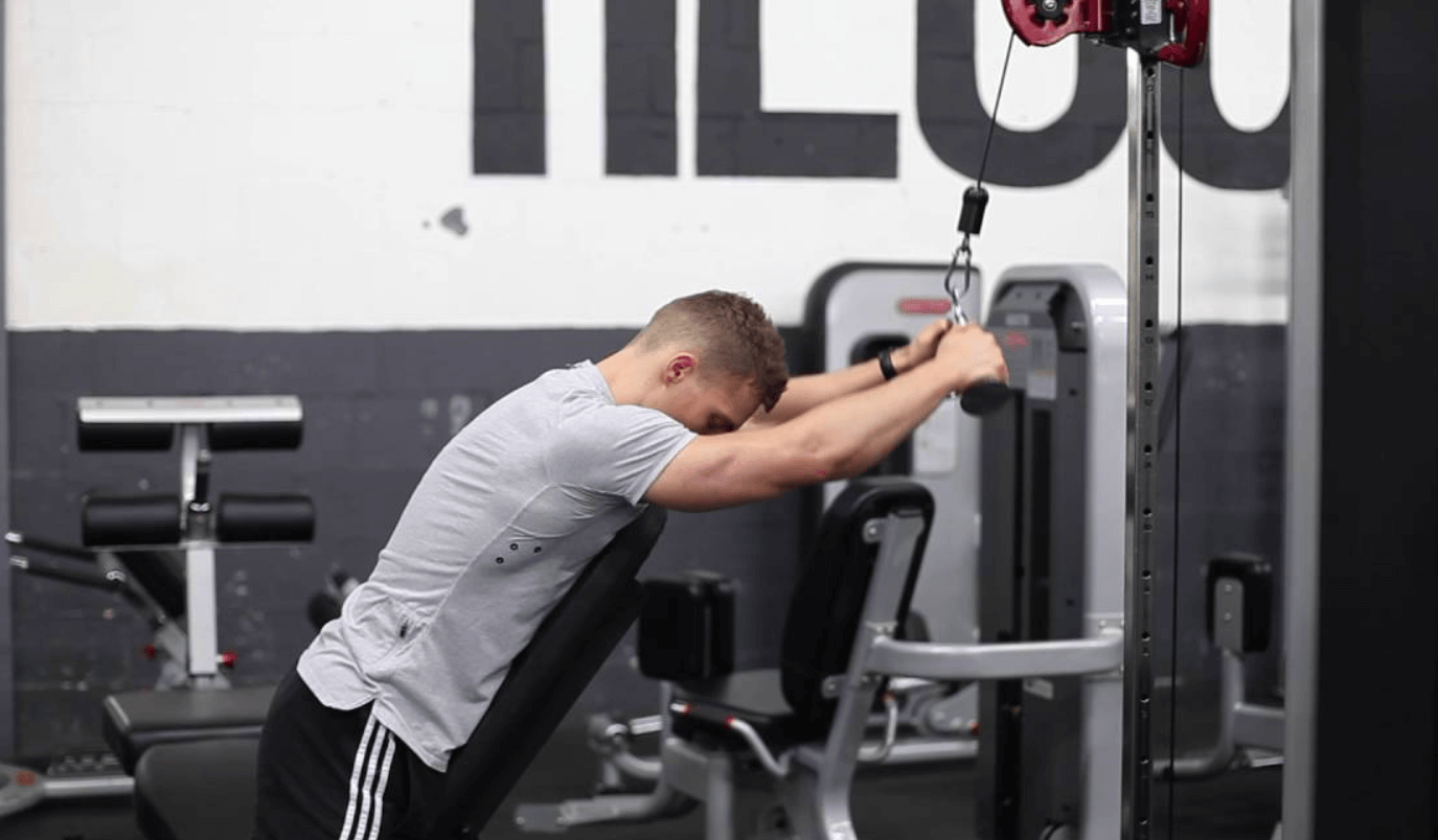 The chest supported pulldown is a machine-based exercise that targets the upper back muscles and helps to improve posture