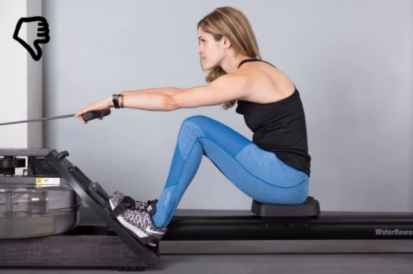 To avoid back strain, it's important to keep a straight and upright posture while rowing